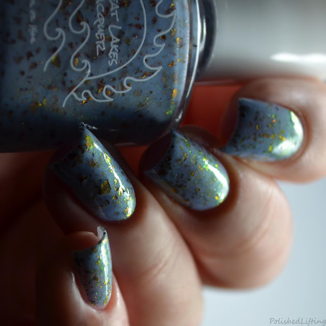 pale blue nail polish with color shifting flake
