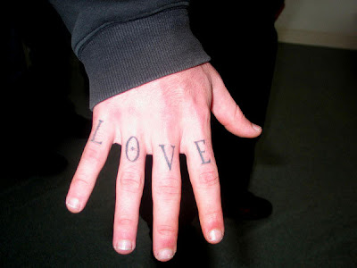 love on fingers tattoo