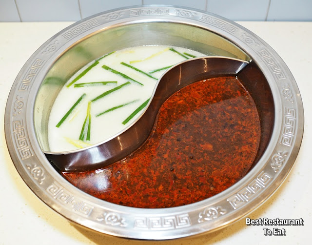 FEI FAN HOT POT Pork Bone Soup and the Spicy Ma La (Sichuan) Soup.