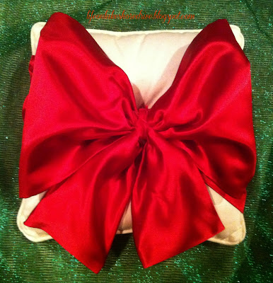 alt="Easy No Sew Pillow with Red Satin Bow tutorial"