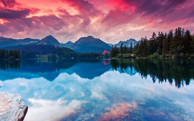 Beautiful Lake Mountains Reflections nature wallpaper. Click on the image above to download for HD, Widescreen, Ultra HD desktop monitors, Android, Apple iPhone mobiles, tablets.