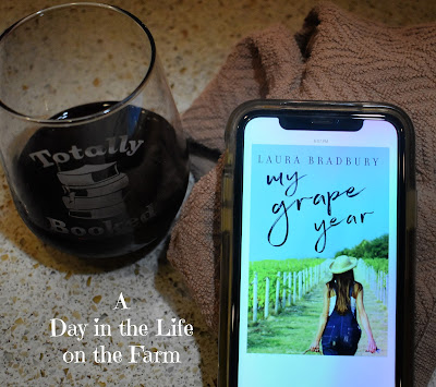 phone with book cover and wine