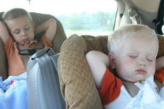 kids sleeping in the car