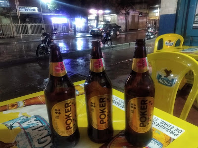 Paths to cleaner living: The odd Poker beer doesn't do too much harm, does it? (Photo shows three litre bottles of Poker on a table in a tienda bar in Verbenal, Bogotá, Colombia.)