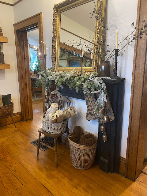 mantle decorated with greenery