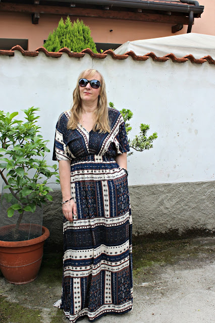 http://www.shein.com/Navy-Split-Tie-Waist-Vintage-Print-Maxi-Dress-p-265045-cat-1727.html