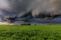 Storm Clouds over farm - Photo by Dave Hoefler on Unsplash