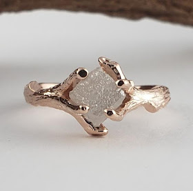 Hand Sculpted Unique One-of-a-kind Engagement Rings with Twigs to hold each Diamond.