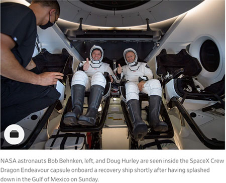 NASA astronauts emerge from the SpaceX Crew Dragon (Source: Wall Street Journal)