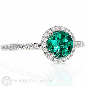 Rare Earth circular emerald engagement ring