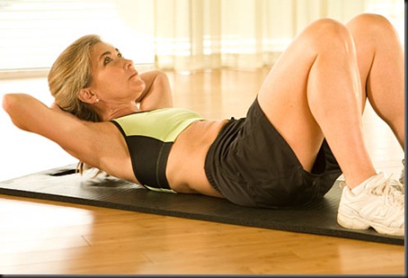 webmd_photo_of_trainer_doing_crunches