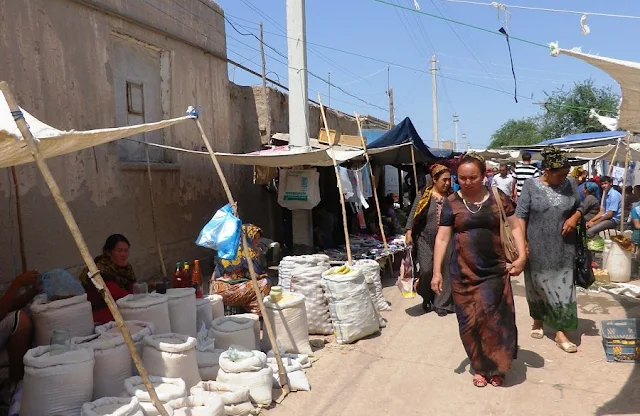 Image Attribute:  Shoppers at the Konye-Urgench Bazaar  Photograph provided by Stephen M. Bland