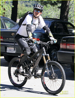 Orlando Bloom Bikes with a friend