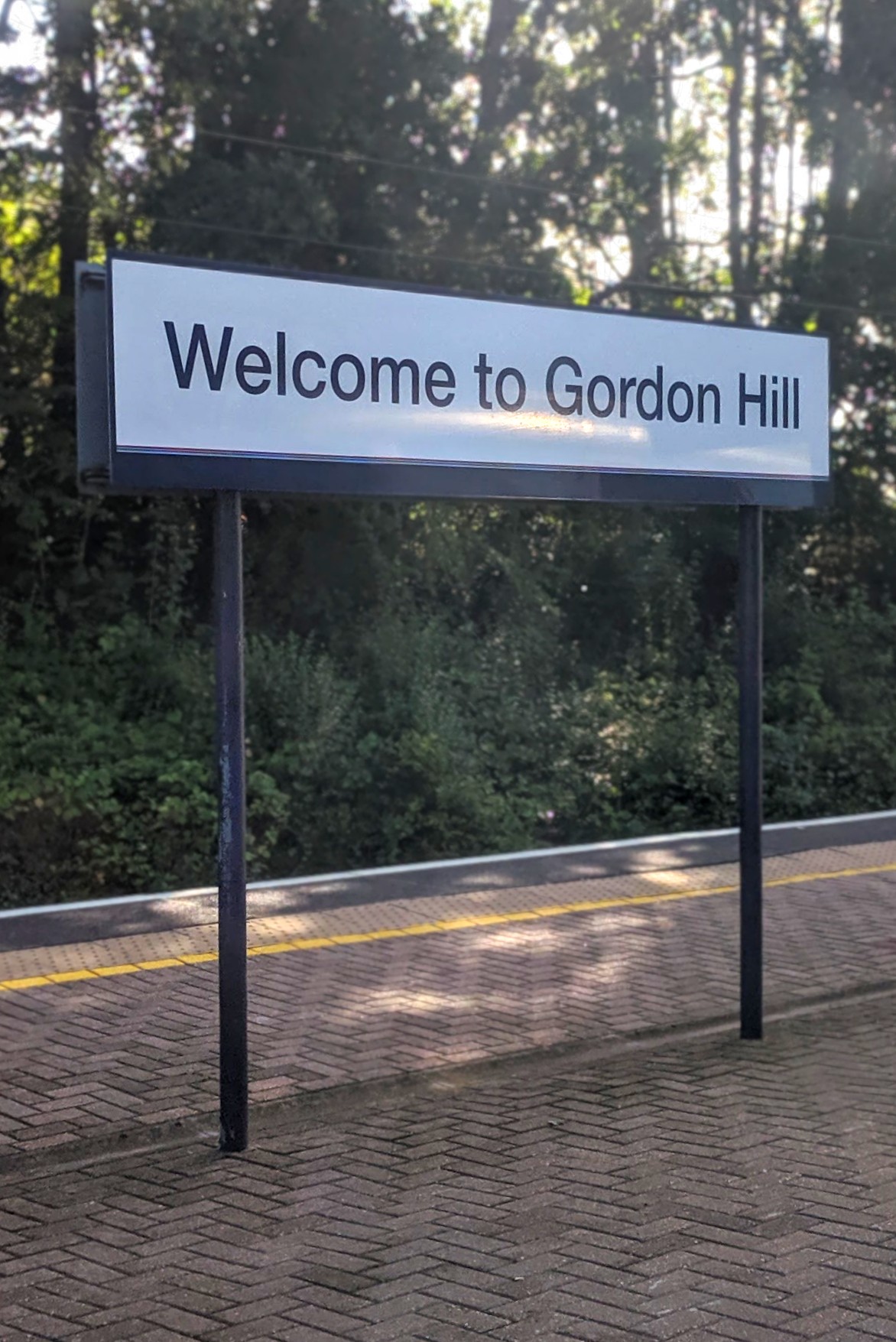 'Welcome to Gordon Hill' station sign
