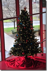 A colorful holiday tree greets visitors in the lobby.