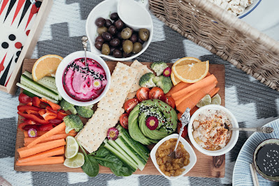 Colorful assortment of healthy foods on a plate, representing a balanced dinner for optimal nutrition."