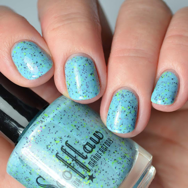 blue glitter nail polish four finger swatch