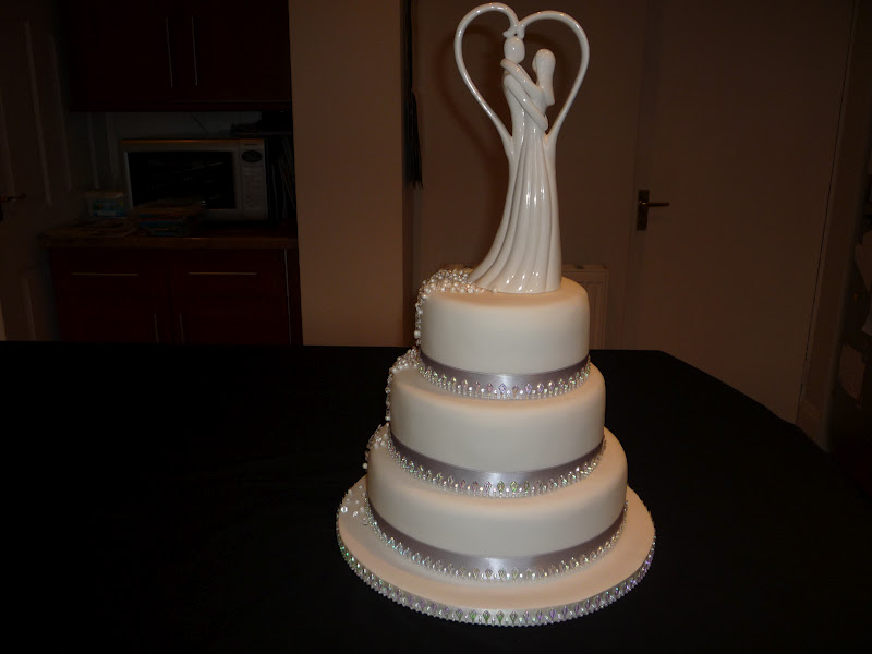 A bit of bling wedding cake diamonds pearls and crystals