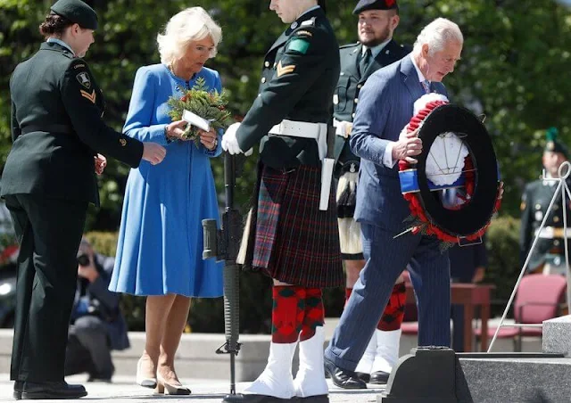 Prince Charles, Prime Minister Justin Trudeau, and Mary Simon, Governor General of Canada. the Duchess of Cornwall wore a blue dress