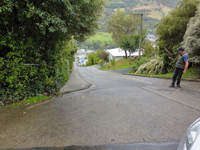 The world's steepest urban street, Baldwin Street, in Dunedin, New Zealand. Its slope reaches 35 percent or 19°, Which means that the distance 2.86 meters road rises by one meter. Baldwin Street is located in the North East Valley. 