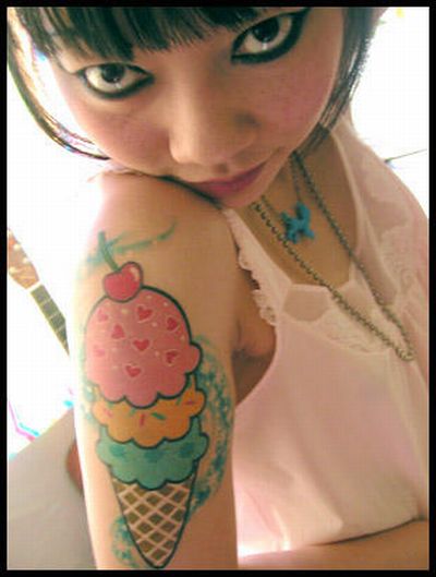 Teen Girl Sporting a Ice Cream Tattoo Design on Arms