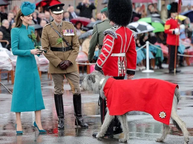 Princess of Wales wore a sea-green coat dress by Catherine Walker. Gold shamrock brooch. Emmy London stiletto heels