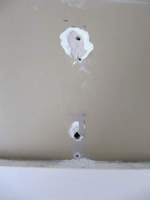 removing plastic wall anchors