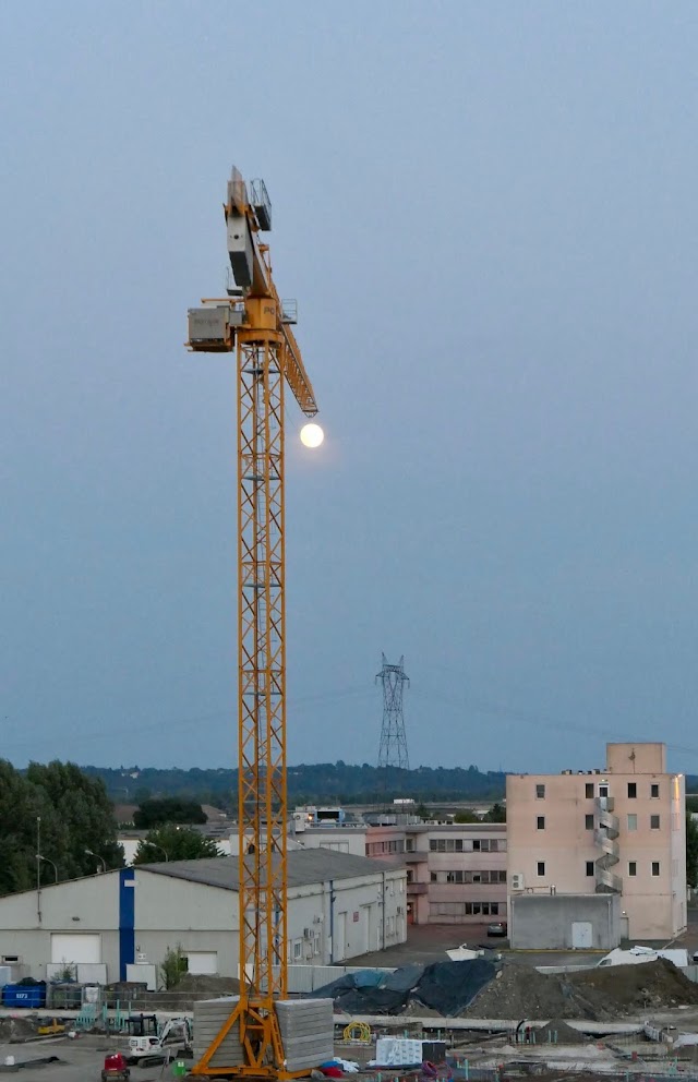 Here is the moon seen from our balcony on Thursday evening