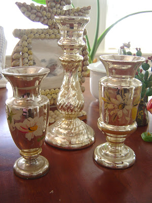 This mercury glass bowl holds some antique mercury glass ornaments.