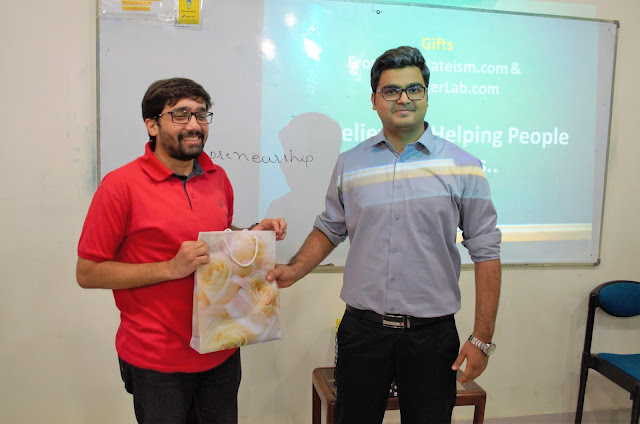 Syed Faizan Ali Giving away Templateism Goodies to Winner