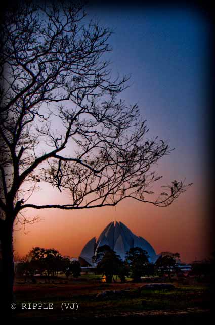 Sunset View @ Lotus Temple, Nehru Place, Delhi: The Baha'i House of Worship in Delhi which is popularly known as the Lotus Temple due to its flower like shape, is a Bahai House of Worship and also a prominent attraction in Delhi. It was completed in 1986 and serves as the Mother Temple of the Indian subcontinent. It has won numerous architectural awards and been featured in hundreds of newspaper and magazine articles.: Posted by Ripple (VJ) on PHOTO JOURNEY @ www.travellingcamera.com : ripple, Vijay Kumar Sharma, ripple4photography, Frozen Moments, photographs, Photography, ripple (VJ), VJ, Ripple (VJ) Photography, Capture Present for Future, Freeze Present for Future, ripple (VJ) Photographs , VJ Photographs, Ripple (VJ) Photography : This weekend some of my friends planned to visit Lotus Temple which is located at Nehru Place, Delhi. I was not doing much at the same time and decided to go with them... We visited Lotus Temple and Iscon Temple because both these places are near by Nehru Place...