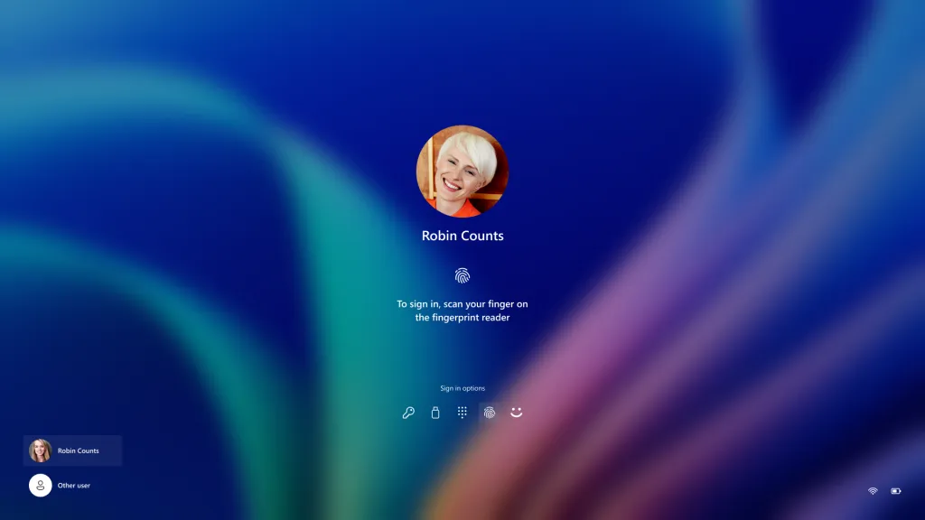 Gambar layar masuk Windows 11 menampilkan ikon Windows Hello yang baru.