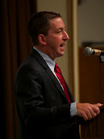 Glenn Greenwald speaking at lectern