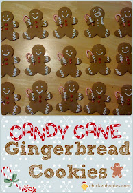 cute gingerbread cookies! These little guys are holding a candy cane, but what else could you have them hold? hmmm . . .