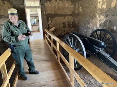 John Heiner, Chief of Interpretation, talks about a cannon at Fort Davis National Historic Site  in Fort Davis, West Texas