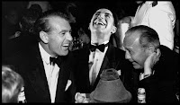 Oskar sitting and laughing with Gary Cooper.