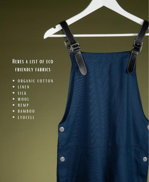 Image of blue cotton dungarees against a green backdrop, with text above stating a list of eco-friendly fabrics.