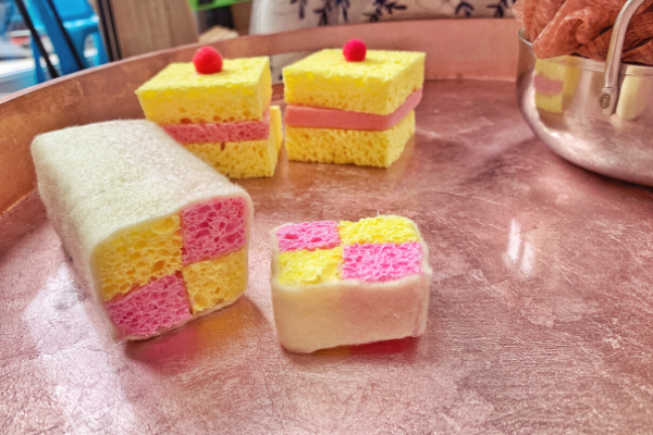 fake battenberg made fro sponges and felt and fake sponge cake with cherry