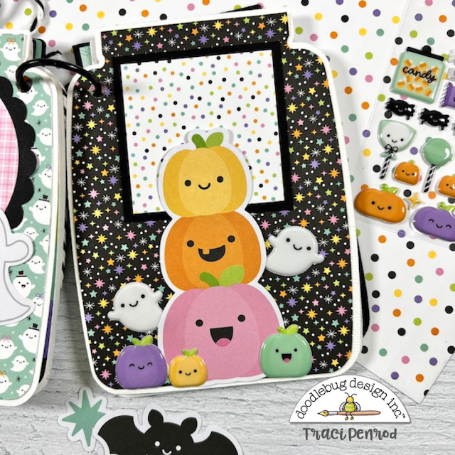 Halloween Scrapbook Mini Album Page with colorful pumpkins, stars, and ghosts