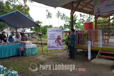 Sambutan Kepala Dinas Perpustakaan dan Kearsipan Provinsi Sulawesi Tengah di peresmian rumah baca kencana desa lombonga