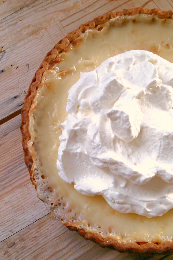 Amish Sugar Cream Pie! Sugar and cream bake together to form a creamy, almost caramelized, satiny smooth filling in this old-fashioned vanilla custard pie recipe.