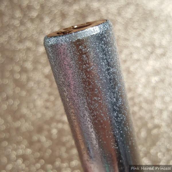 close up of glittering Lancome holiday edition lipstick case