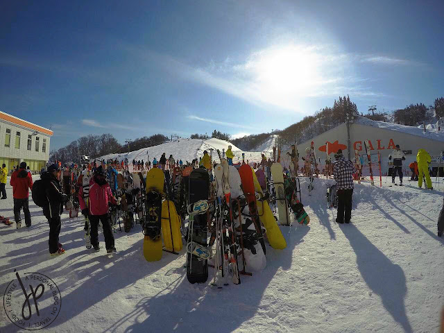 people in winter clothes, snow resort, snowboards