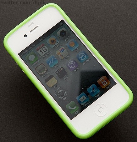 White iPhone 4 with green bumper