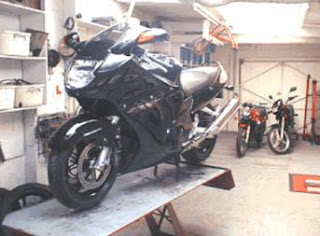 motorcycle maintenance with table lifts