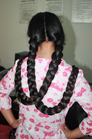 Twin Braids hairstyle photos women with very long hair