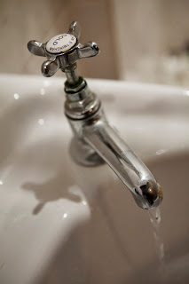 basin tap repair by emergency plumber