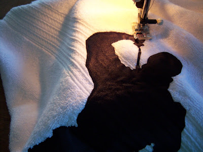 Appliques can be unruly if not tamed properly - like sewing down the edges.