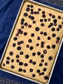 Jelly roll pan with finished baked blueberry pancakes.