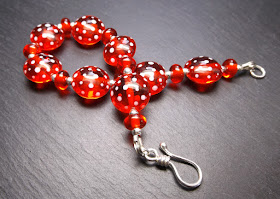 Lampwork glass bead and sterling silver bracelet by Laura Sparling